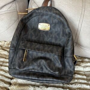 Michael Kors Jet Set Signature Backpack in Brown